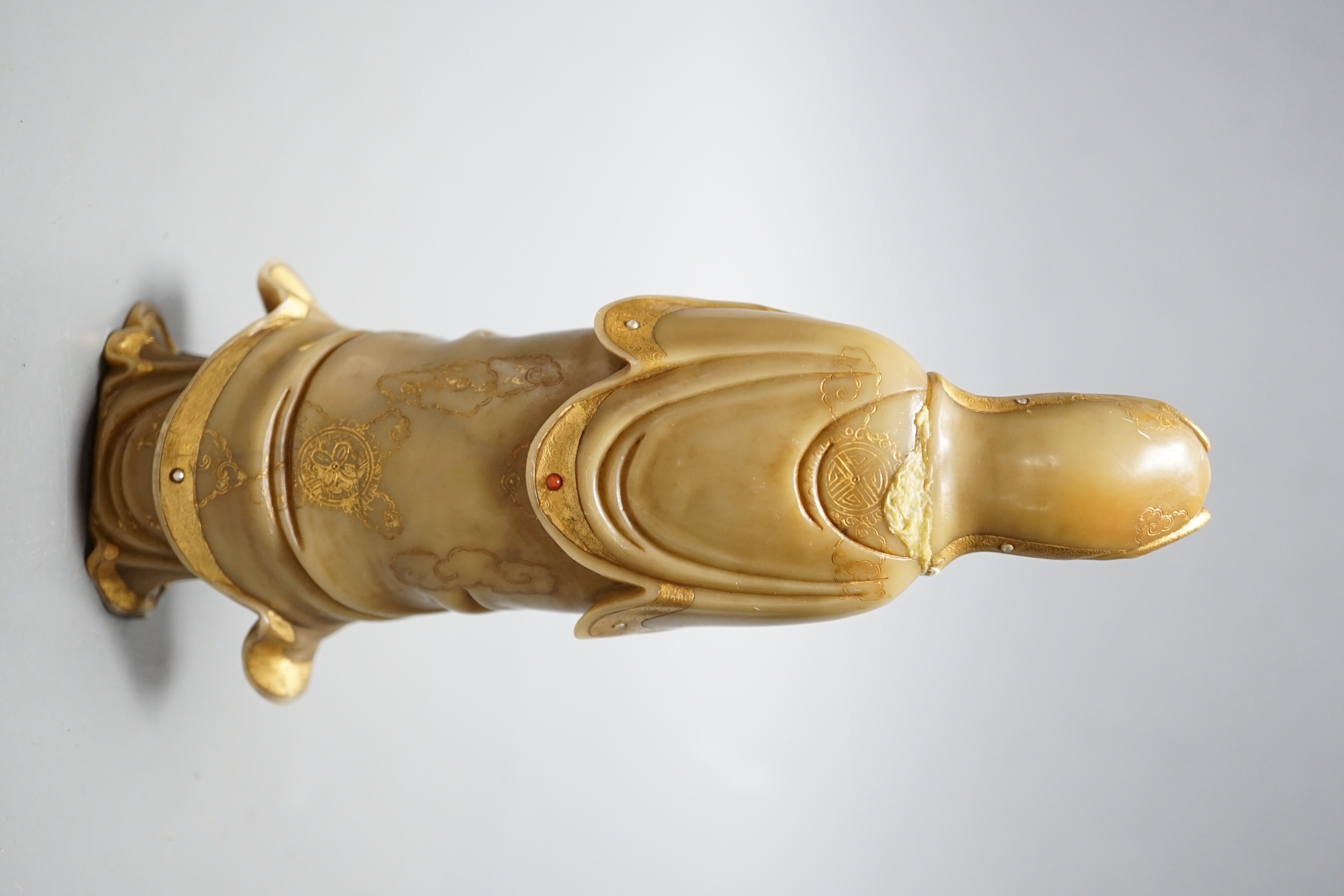 A Chinese gilded and polychrome soapstone figure of Guanyin, 16cm